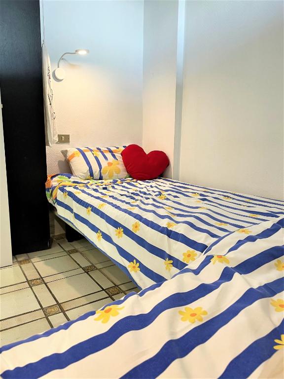 Posteľ alebo postele v izbe v ubytovaní New holiday apartment right on the beach