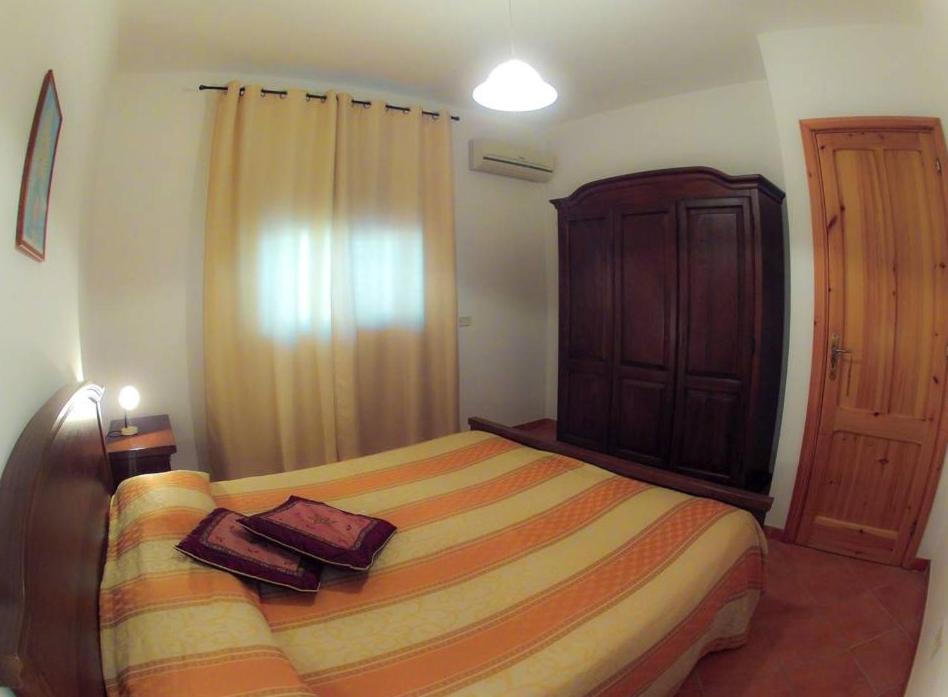 Posteľ alebo postele v izbe v ubytovaní Borgo Il Faro