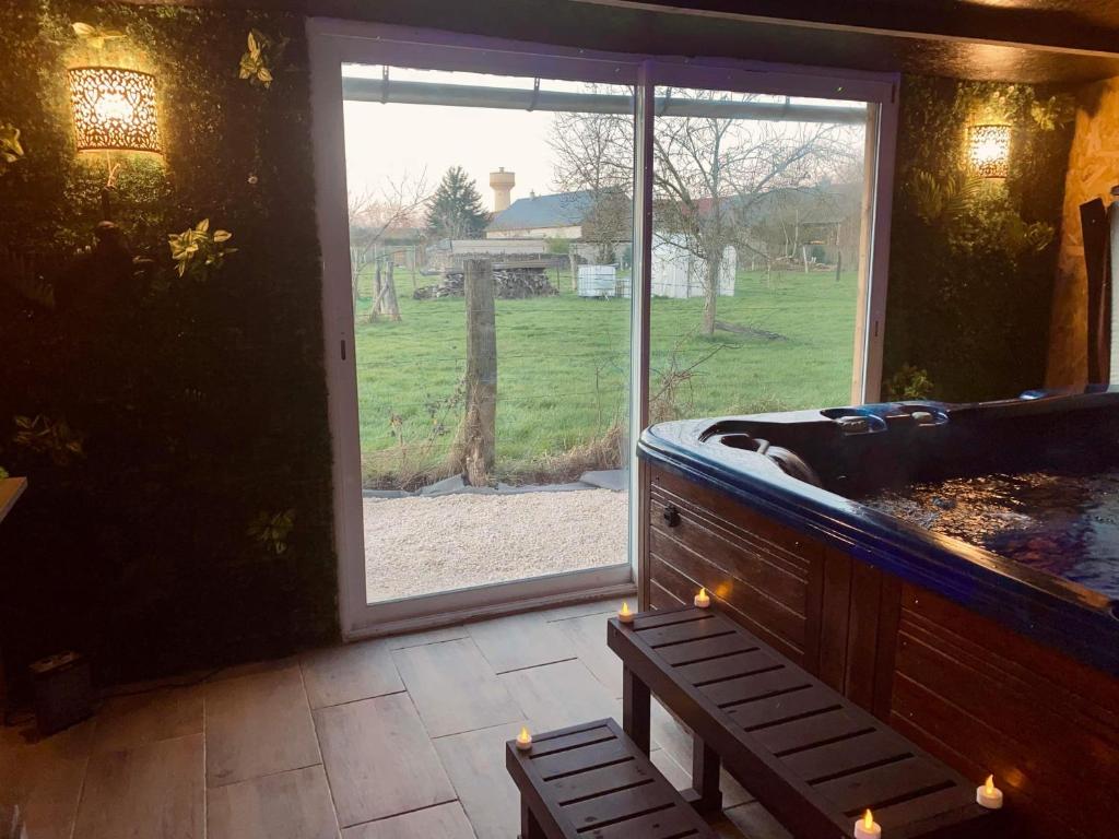 Zahrada ubytování Chambre avec spa privé