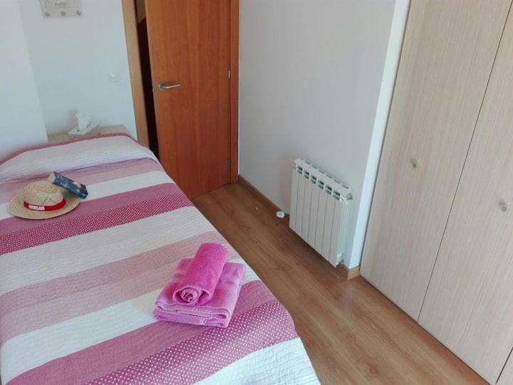 Posteľ alebo postele v izbe v ubytovaní Apartament Catalunya, céntrico y con Parking