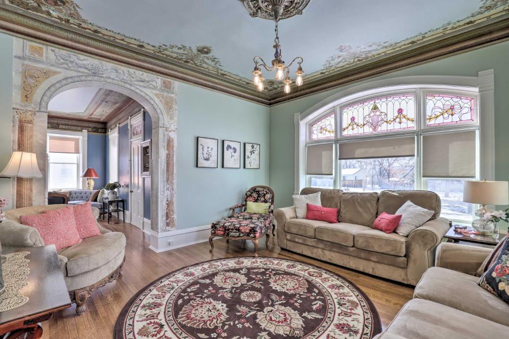 a living room with two couches and a window at Charming Mt Pleasant Home in Historic Dtwn! in Spring City