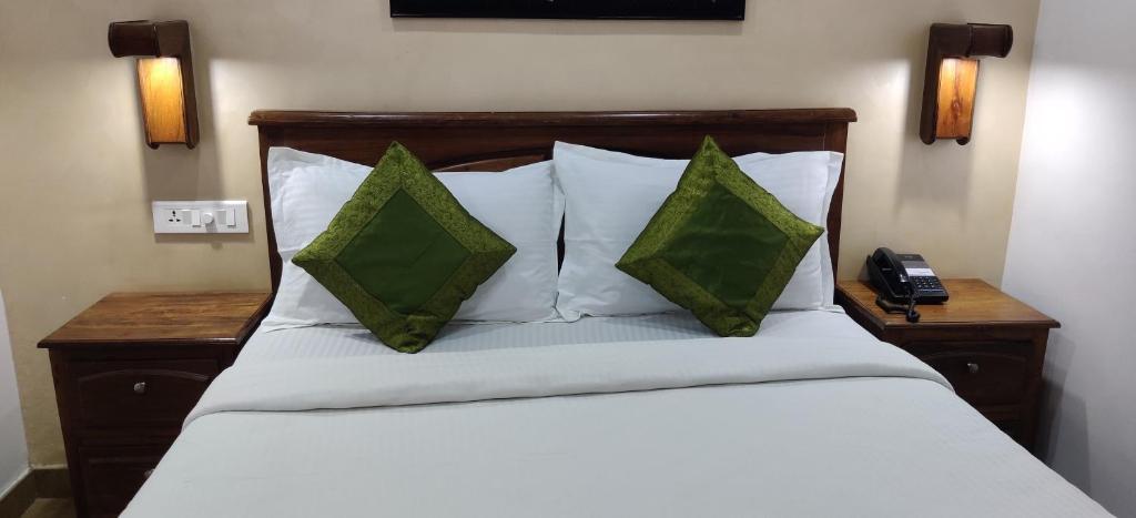 Postel nebo postele na pokoji v ubytování Hotel Mart View