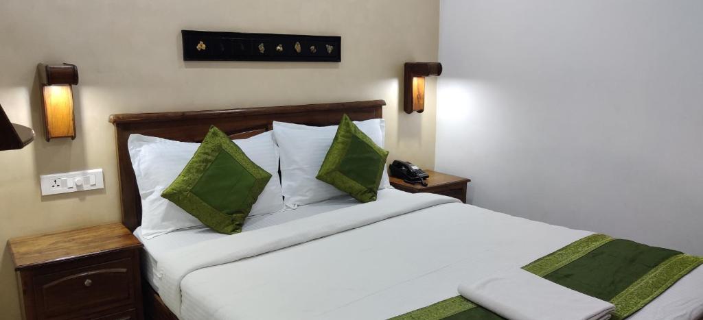Postel nebo postele na pokoji v ubytování Hotel Mart View