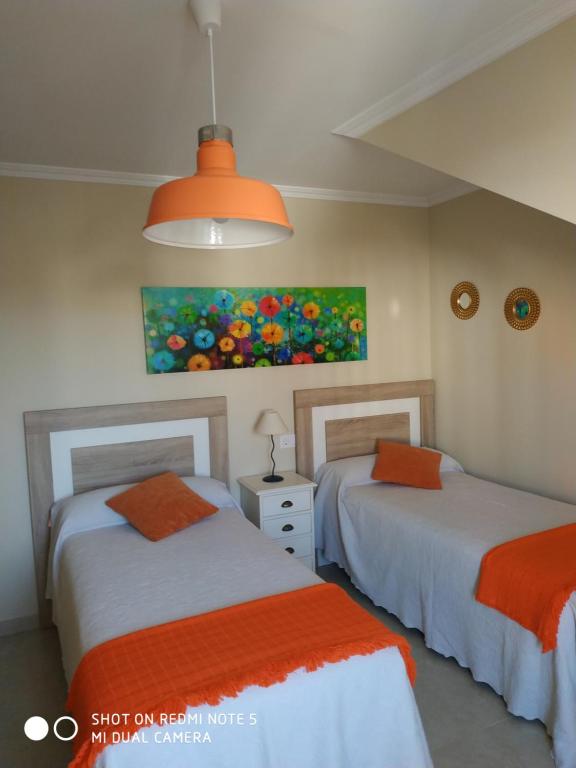 A bed or beds in a room at Anamari's
