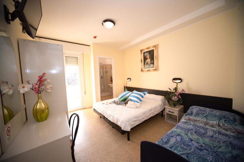 Hotel Cristina Hospitality Centrale - Habitación Cuádruple Superior