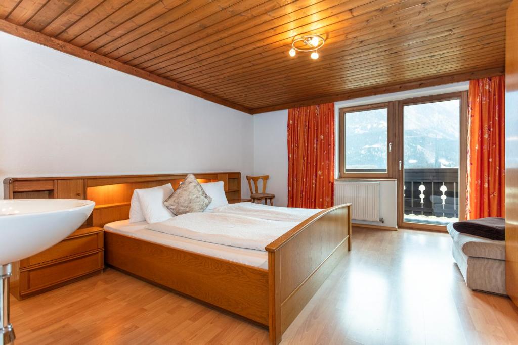 Posteľ alebo postele v izbe v ubytovaní Gästehaus Dreier
