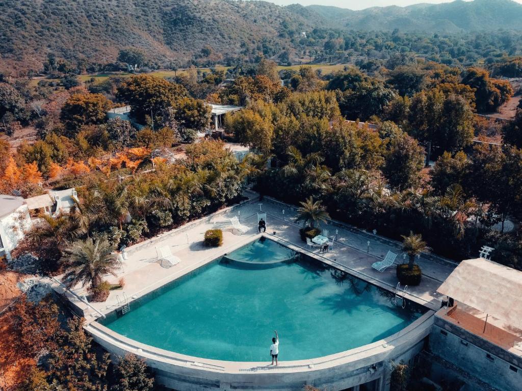an overhead view of a swimming pool on a house at The HighGarden Resort in Udaipur