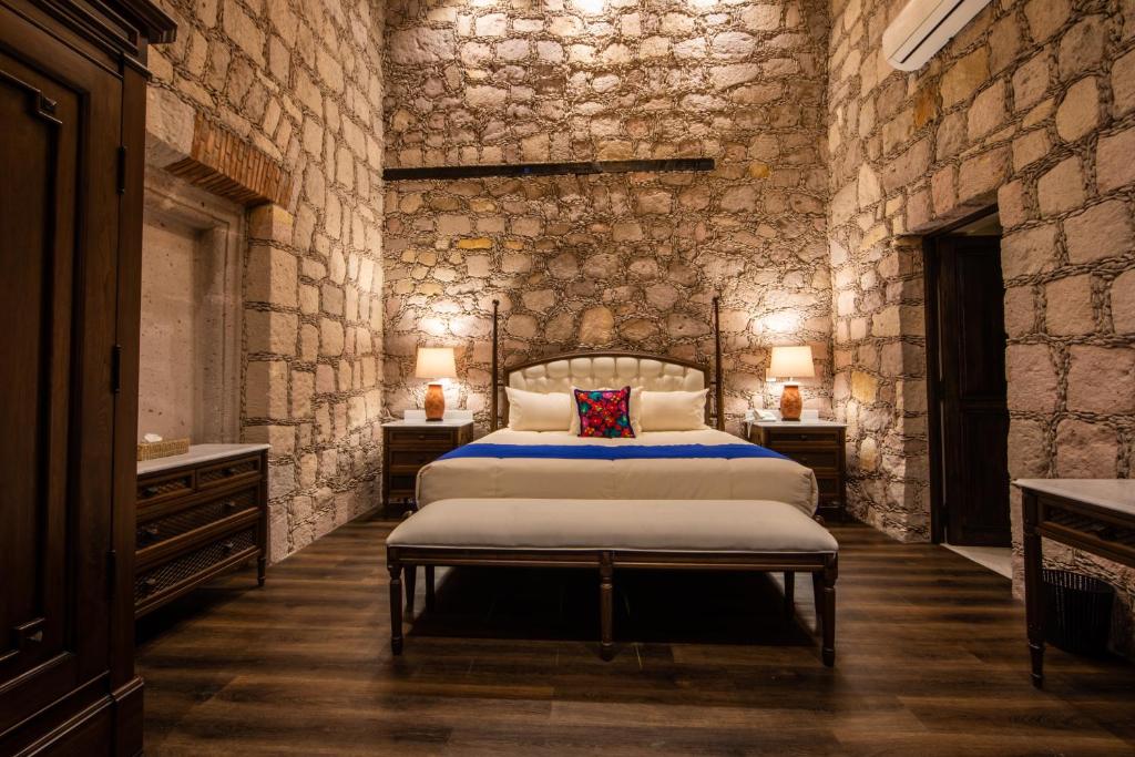 Giường trong phòng chung tại Casa Vieja Hotel Boutique