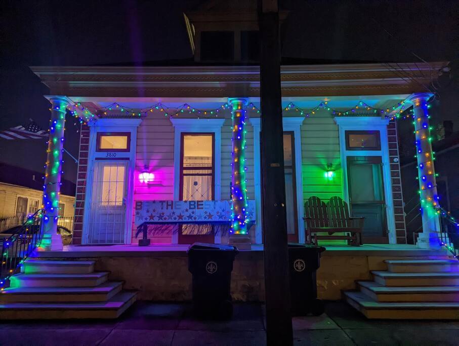 a house with christmas lights on the front of it at Royal Sunshine in New Orleans