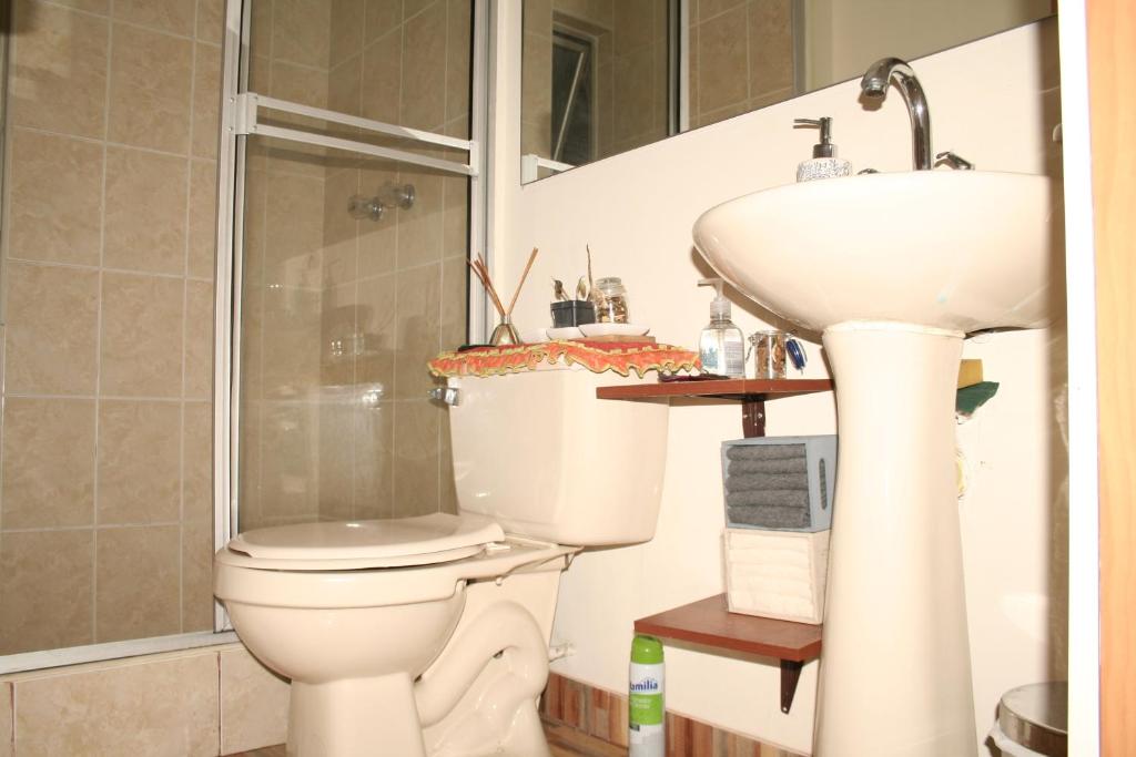 Koupelna v ubytování AlohaT Habitaciones