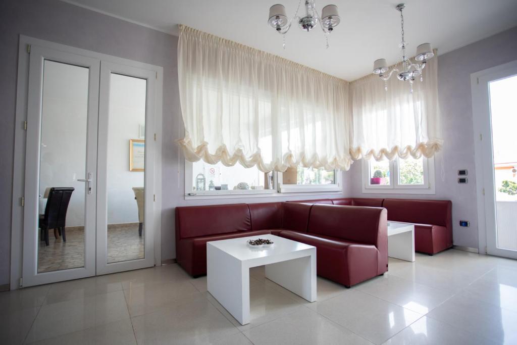 Posezení v ubytování Hotel Perla Dello Ionio