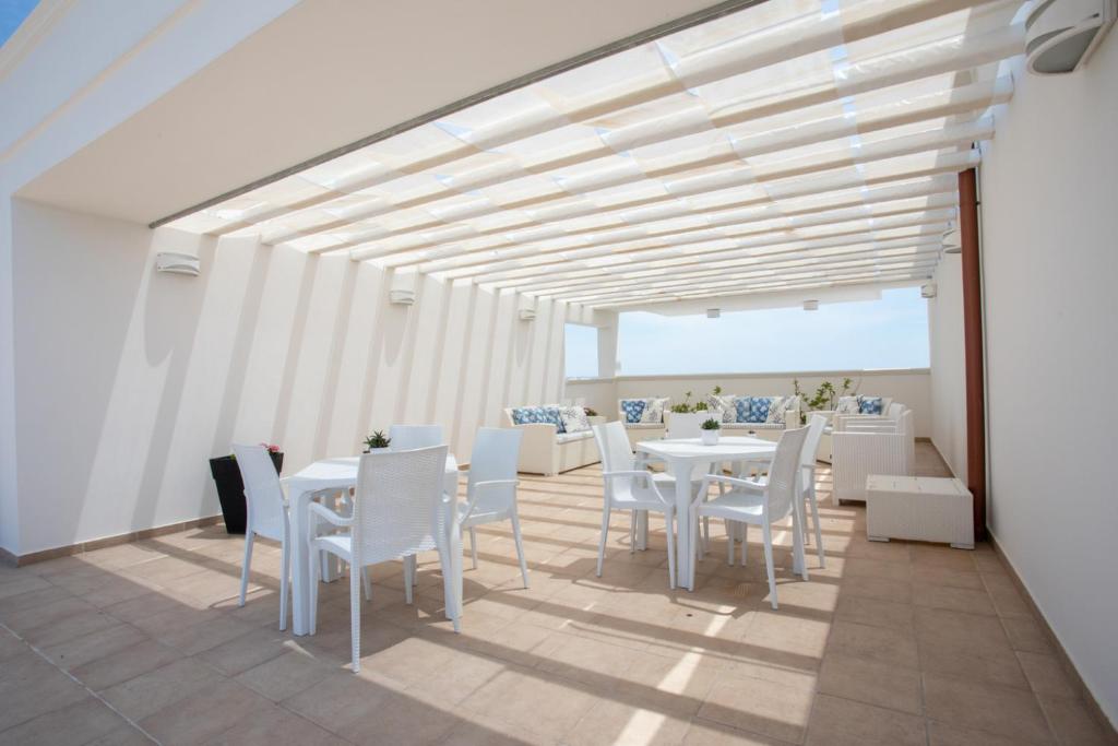 Posezení v ubytování Hotel Perla Dello Ionio