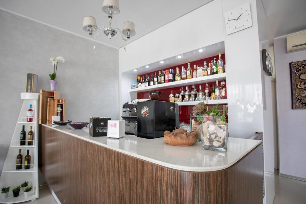 Nápoje v ubytování Hotel Perla Dello Ionio