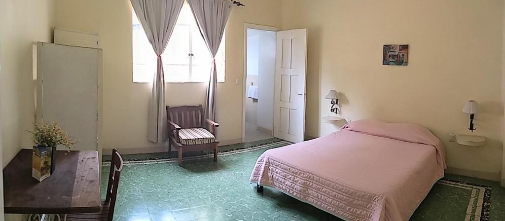 Postel nebo postele na pokoji v ubytování Hotel Suites Córdoba