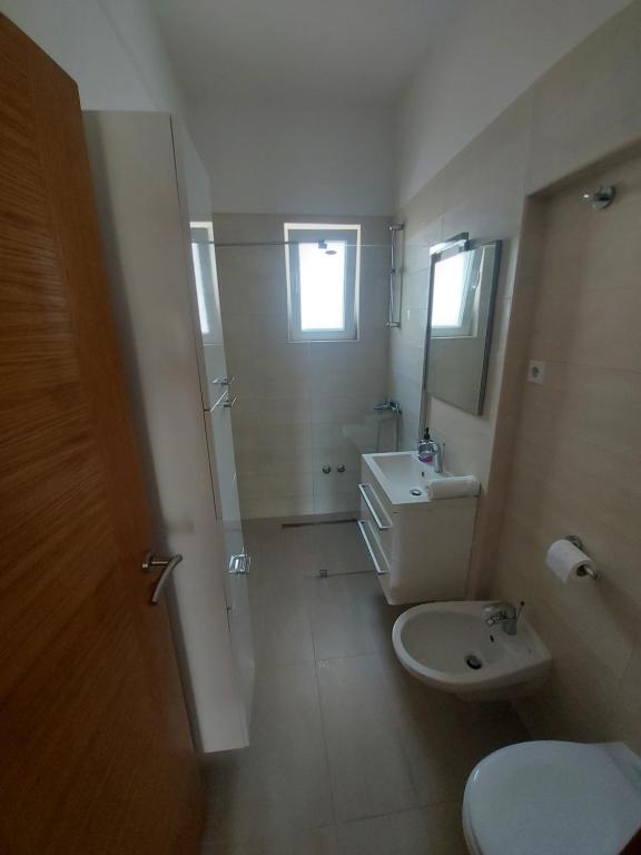 Koupelna v ubytování Apartmani Barka