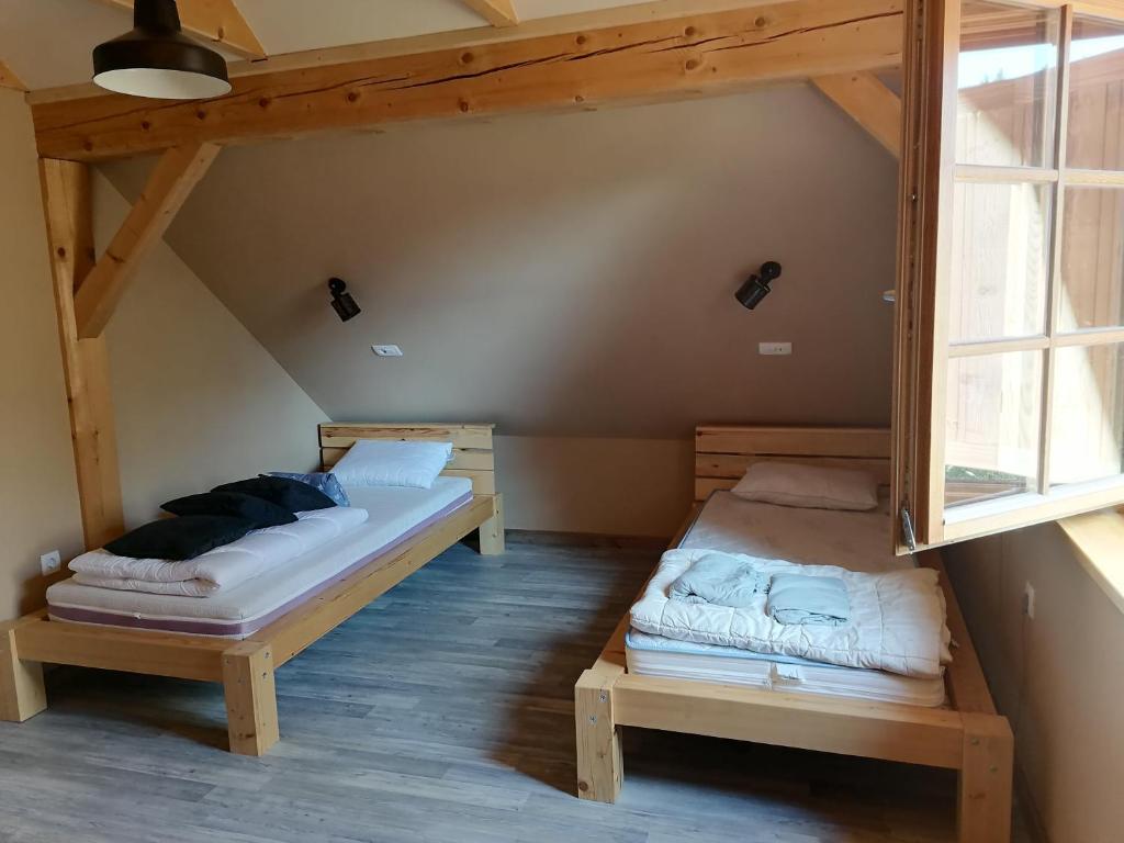 Postel nebo postele na pokoji v ubytování Cottage Golenovo