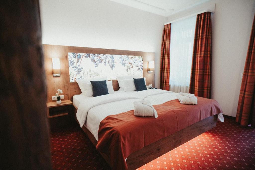 Postel nebo postele na pokoji v ubytování Hotel Rodderhof