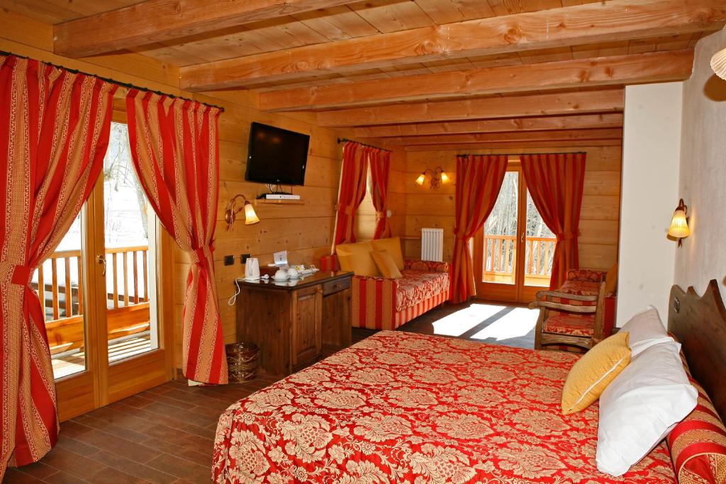 Postel nebo postele na pokoji v ubytování Les Combes