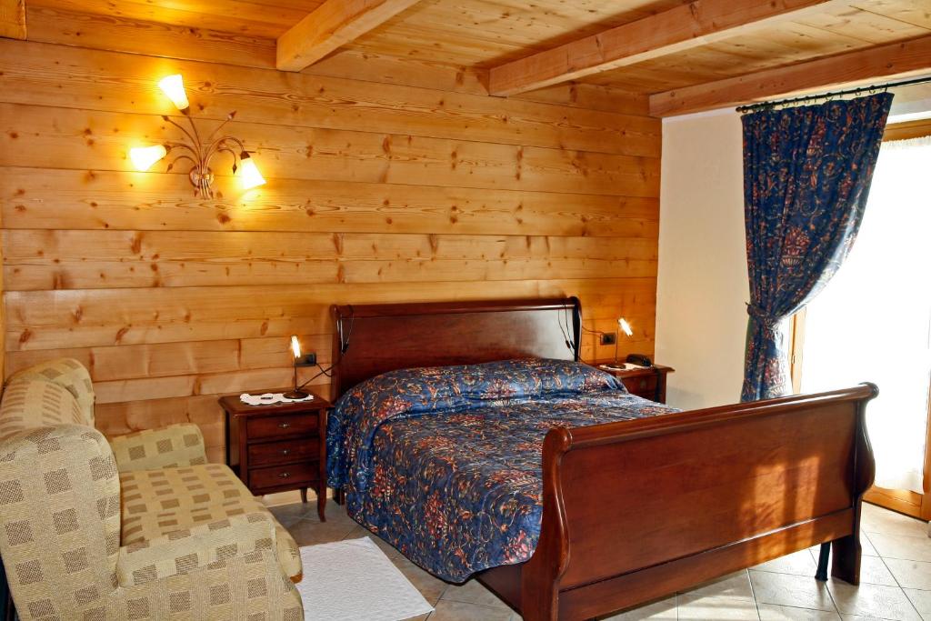 Postel nebo postele na pokoji v ubytování Les Combes