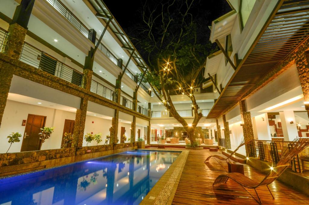 Bazén v ubytování Marianne Hotel nebo v jeho okolí