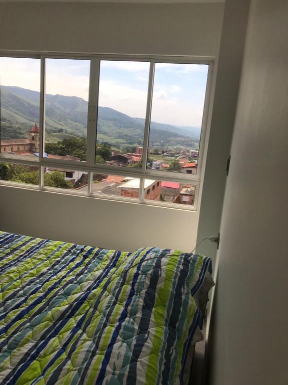 Postel nebo postele na pokoji v ubytování CASA TOÑITA