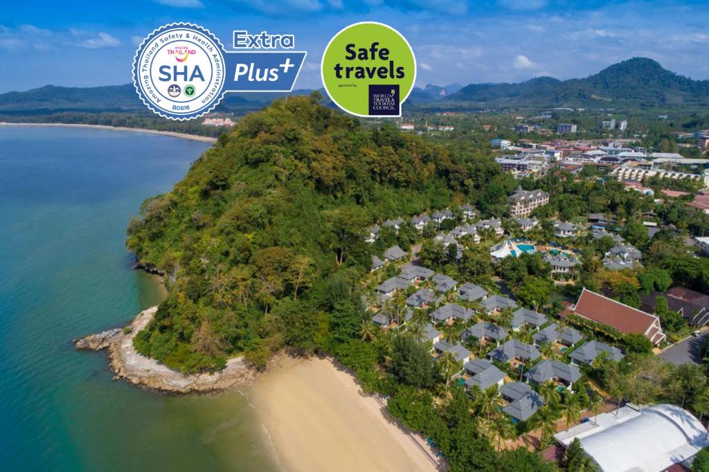 an island with a resort and the words shek trays at Krabi Resort- SHA Extra Plus in Ao Nang Beach