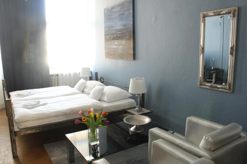 Postel nebo postele na pokoji v ubytování ArtHotel Connection