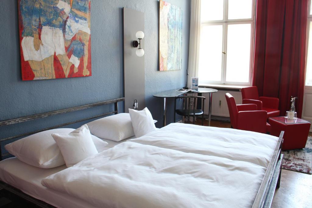 Postel nebo postele na pokoji v ubytování ArtHotel Connection