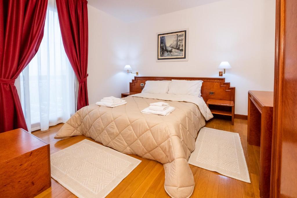 Postel nebo postele na pokoji v ubytování Hotel Fuori Città
