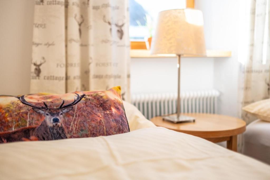 Posteľ alebo postele v izbe v ubytovaní Haus Standlgut Rauris -- incl Sommercard