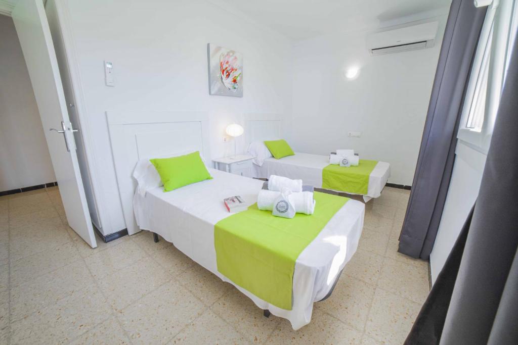 A bed or beds in a room at Villa Diana