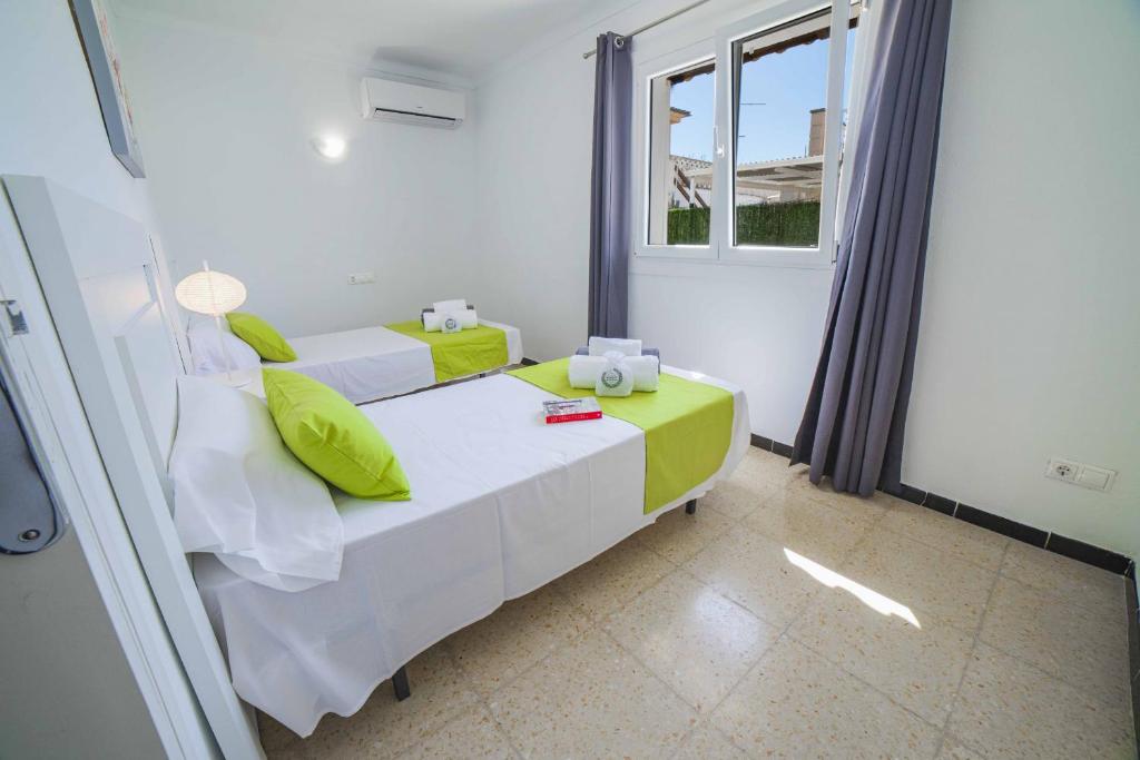 A bed or beds in a room at Villa Diana