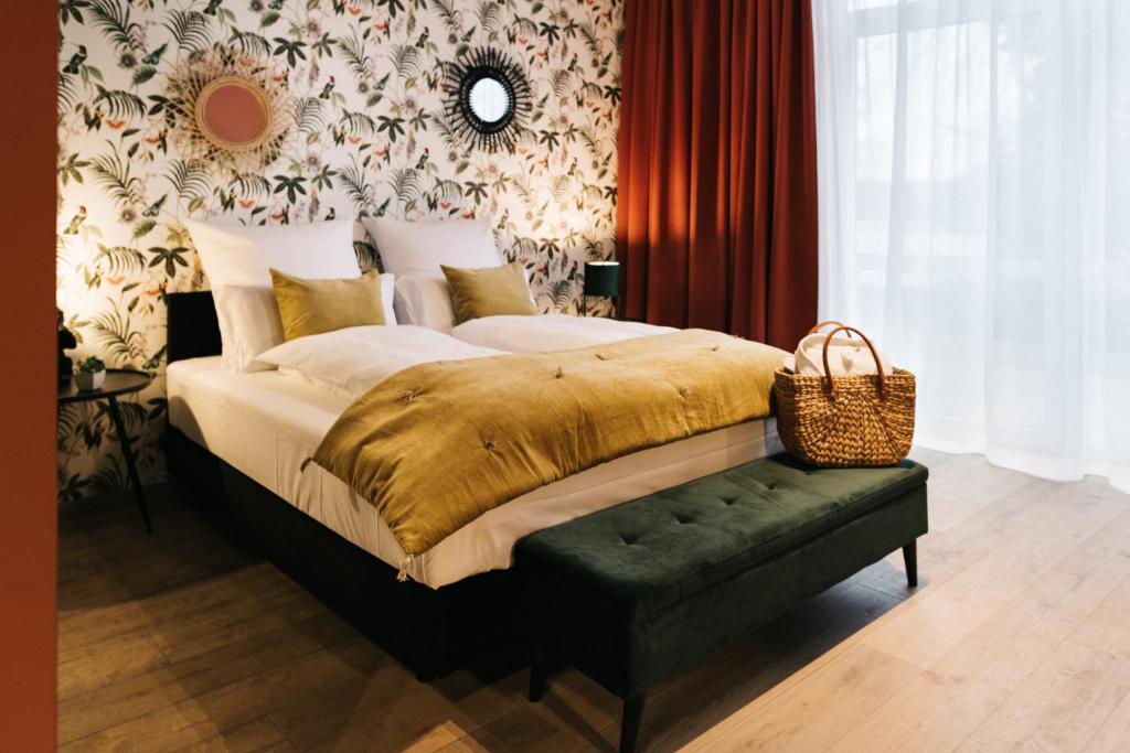 Кровать или кровати в номере Freilich am See - Gästezimmer