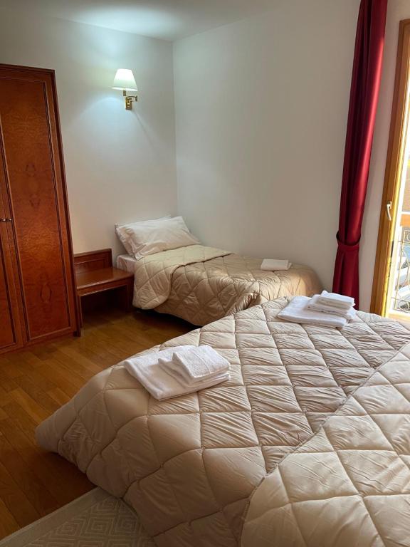 Postel nebo postele na pokoji v ubytování Hotel Fuori Città