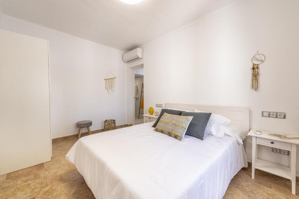 Postel nebo postele na pokoji v ubytování Villa Calma