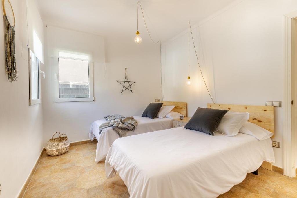 Postel nebo postele na pokoji v ubytování Villa Calma