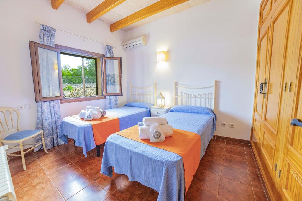 Postel nebo postele na pokoji v ubytování Villa Ca na Quarta