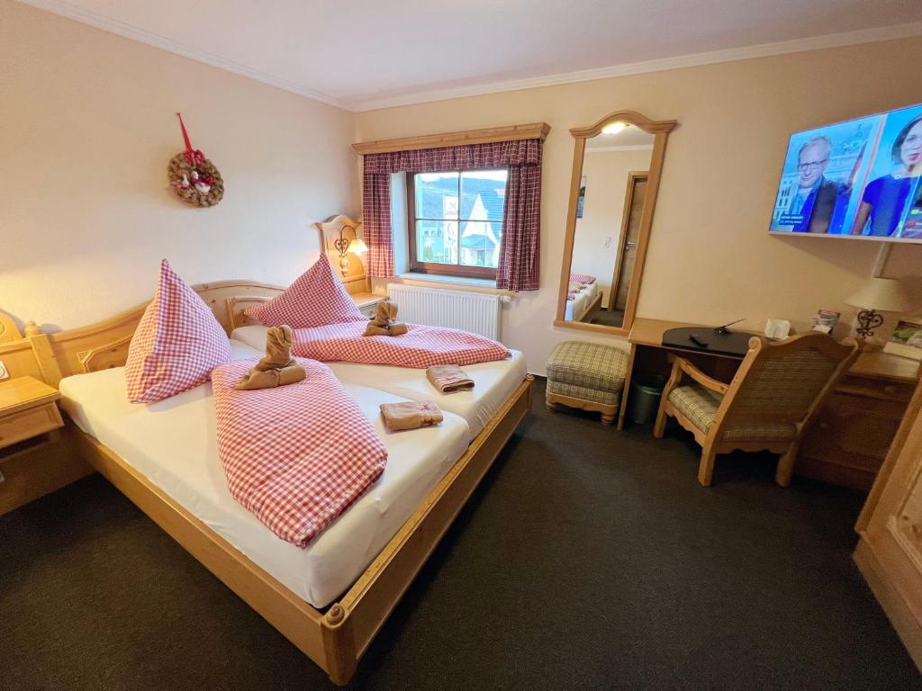 Postel nebo postele na pokoji v ubytování Hotel Sonnekalb