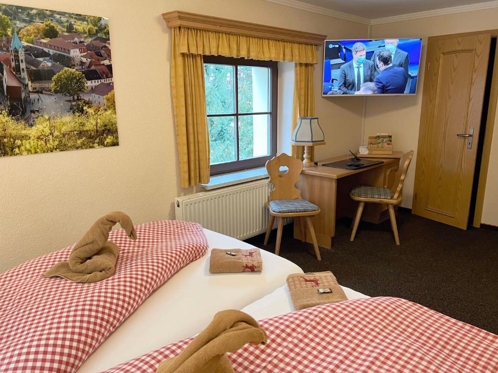 Postel nebo postele na pokoji v ubytování Hotel Sonnekalb