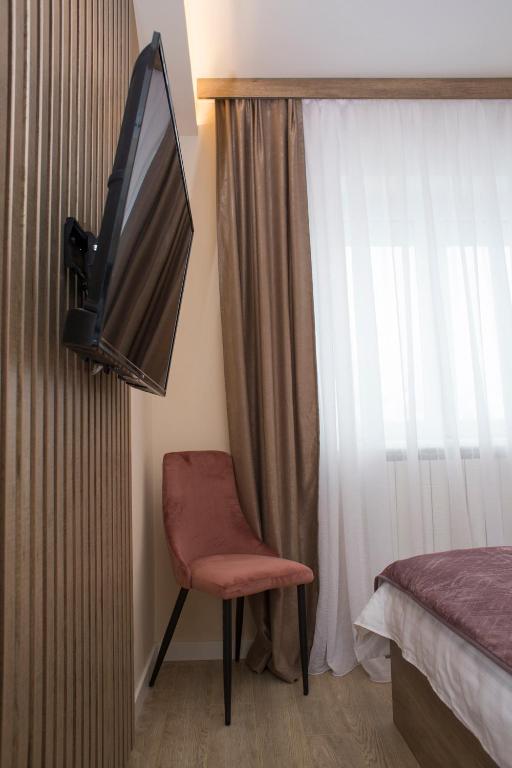 TV a/nebo společenská místnost v ubytování Galaxy Apartments