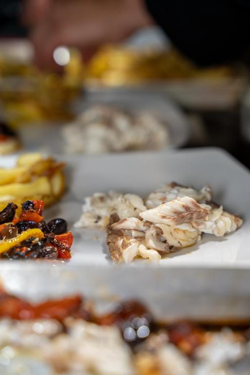 a white tray filled with different types of food at Agriturismo Buranco in Monterosso al Mare