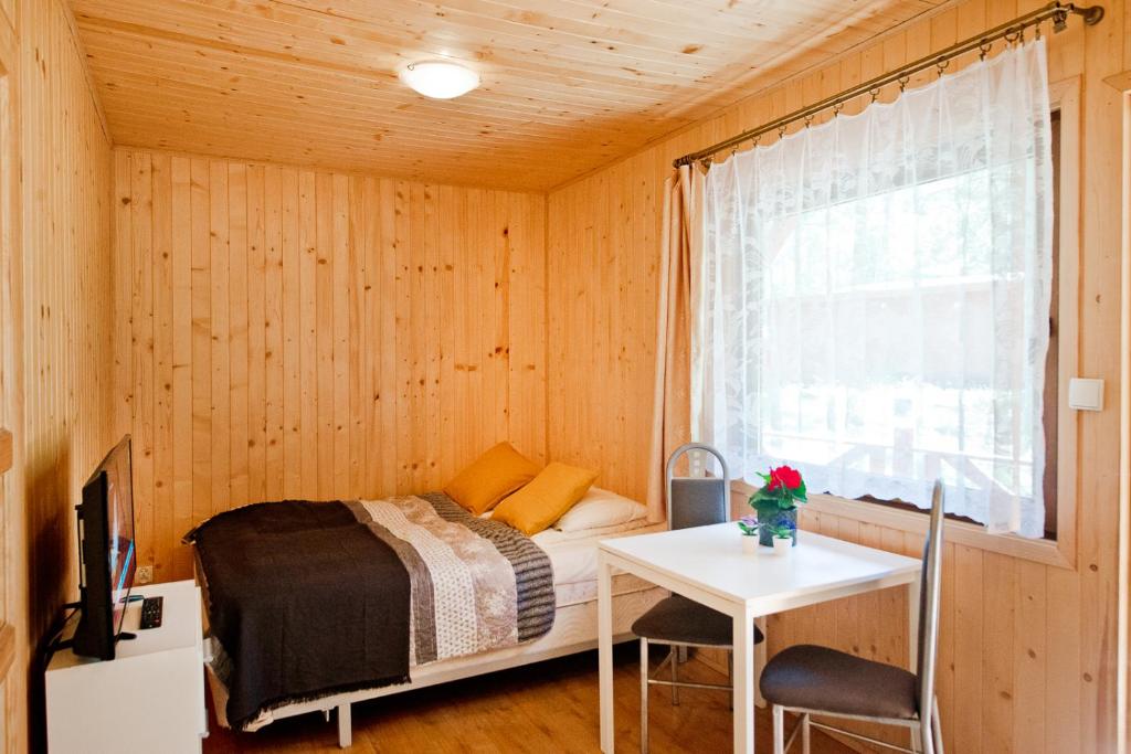 Postel nebo postele na pokoji v ubytování Ośrodek Wypoczynkowy Cubex