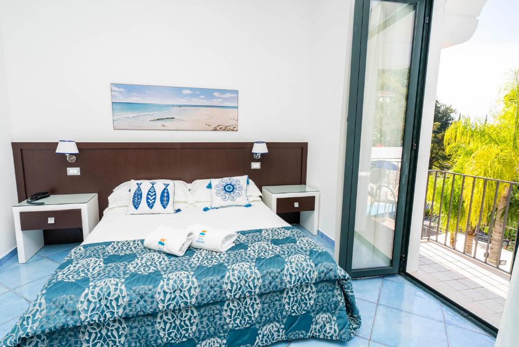 Postel nebo postele na pokoji v ubytování Hotel Murmann