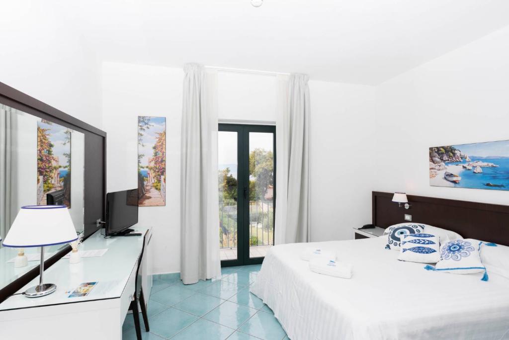 TV a/nebo společenská místnost v ubytování Hotel Murmann