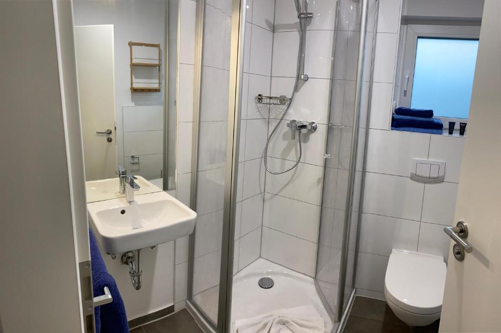 Koupelna v ubytování Boardinghouse am Borkumkai