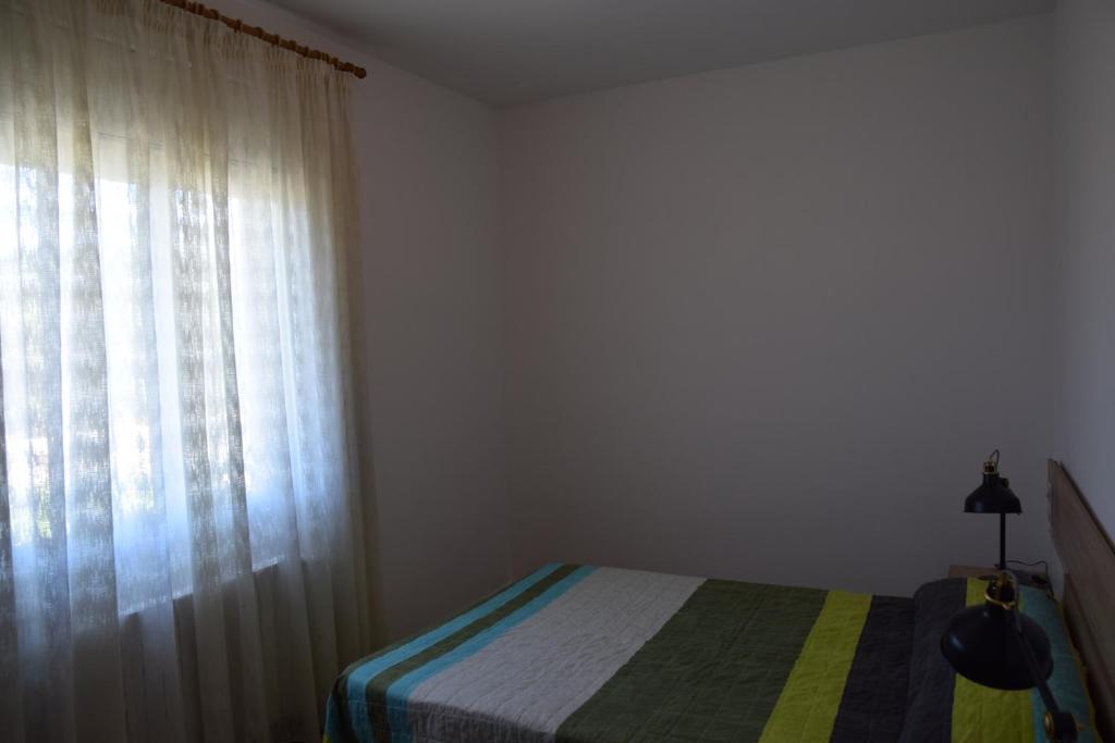 Posteľ alebo postele v izbe v ubytovaní Gaudi CostaBravaSi