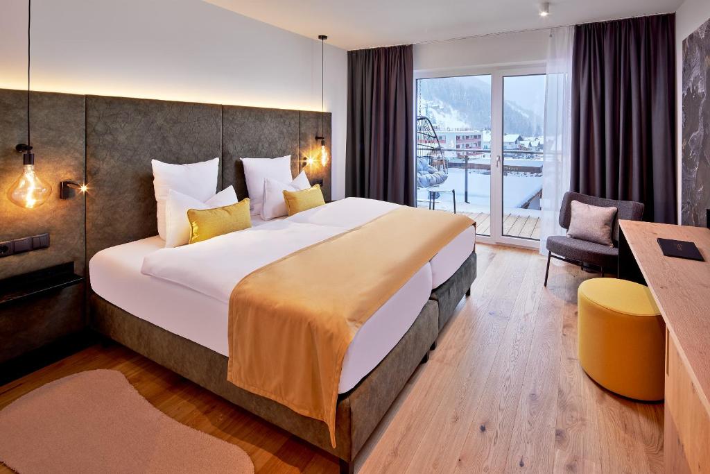 Posteľ alebo postele v izbe v ubytovaní Active Nature Resort DAS SeeMOUNT