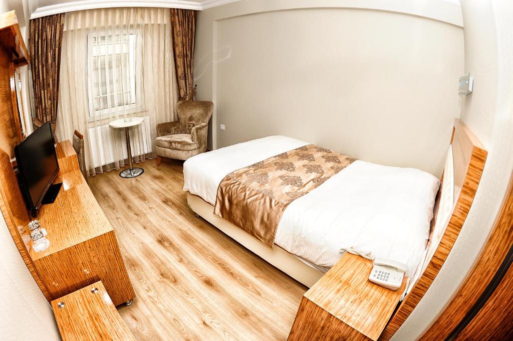 Postel nebo postele na pokoji v ubytování Serenti Pamuk Hotel