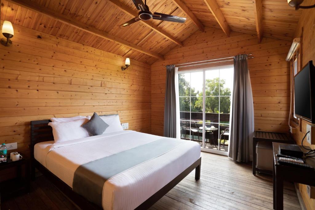 Postel nebo postele na pokoji v ubytování White Wood Resort By Stone Wood Hotels