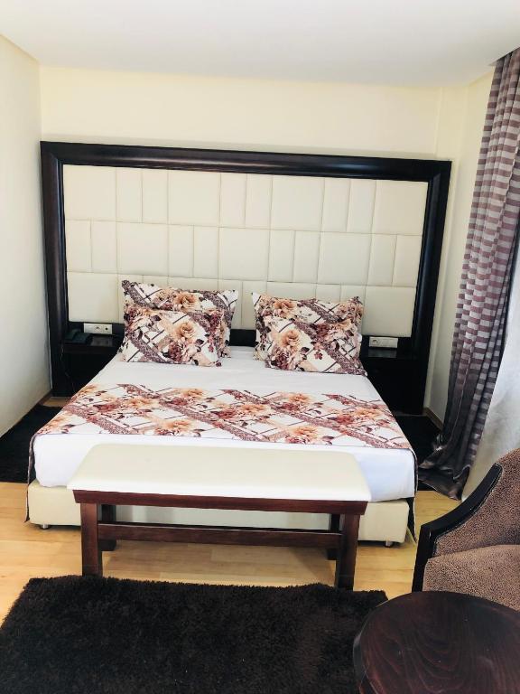 Postel nebo postele na pokoji v ubytování Dream's Hotel